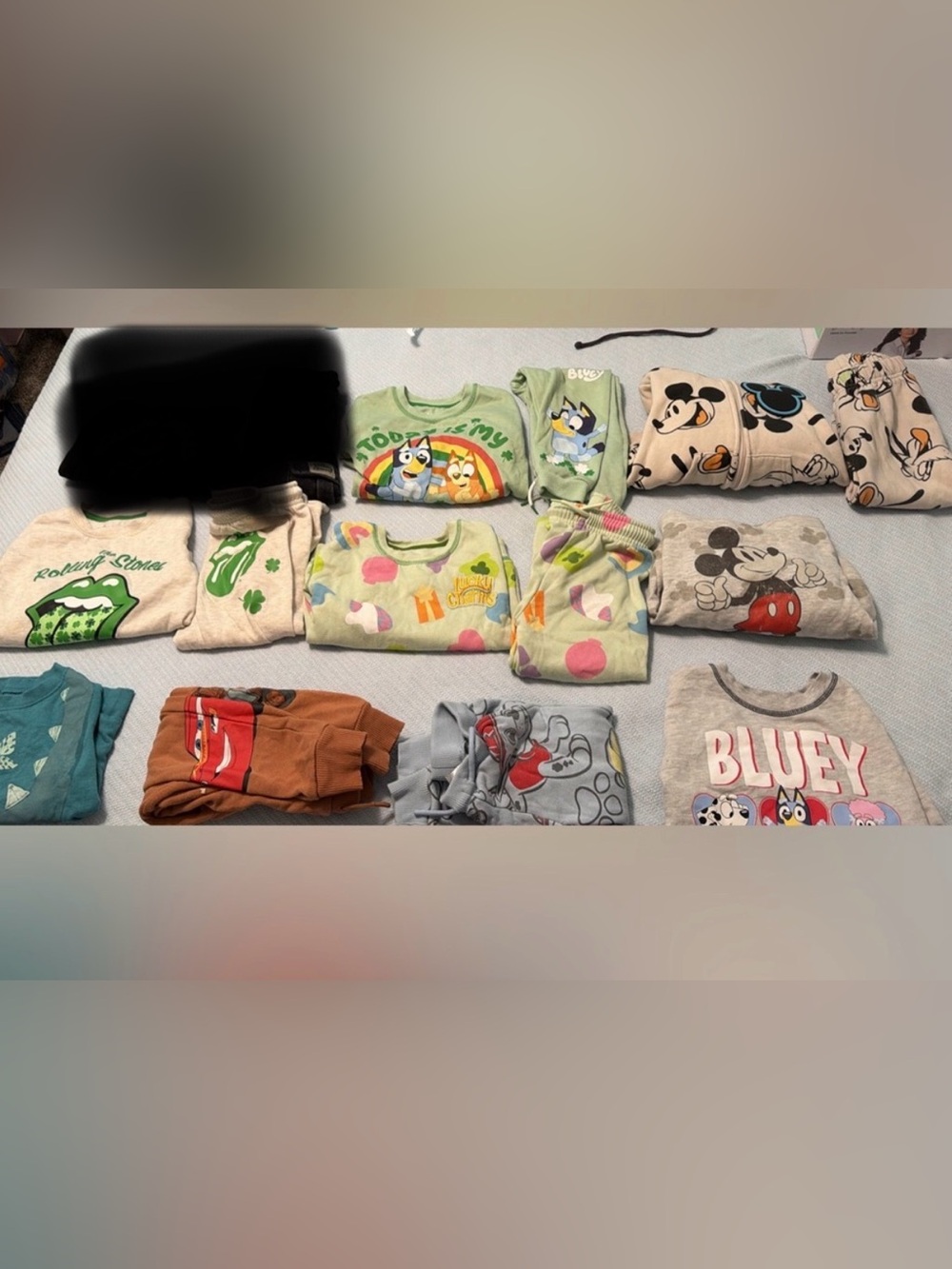 5 sweat sets- top and bottoms 
3 sweatshirts
2 pairs of sweatpants